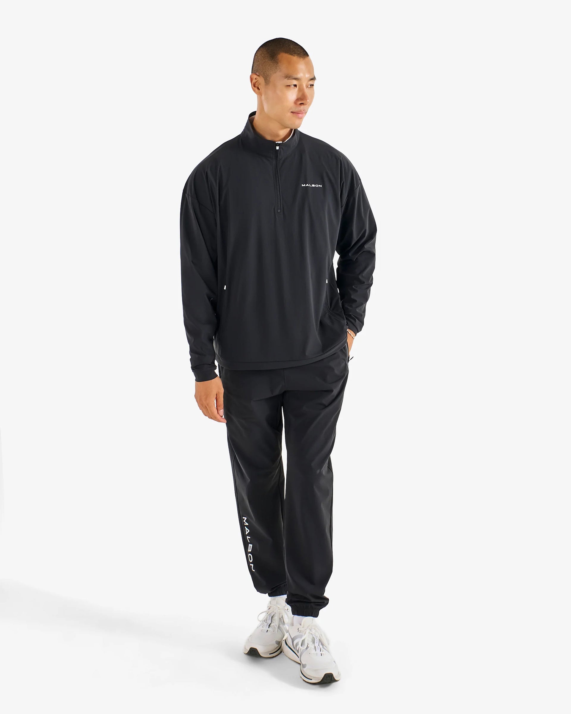 Malbon Performance Quarter Zip Shell Pullover - Black